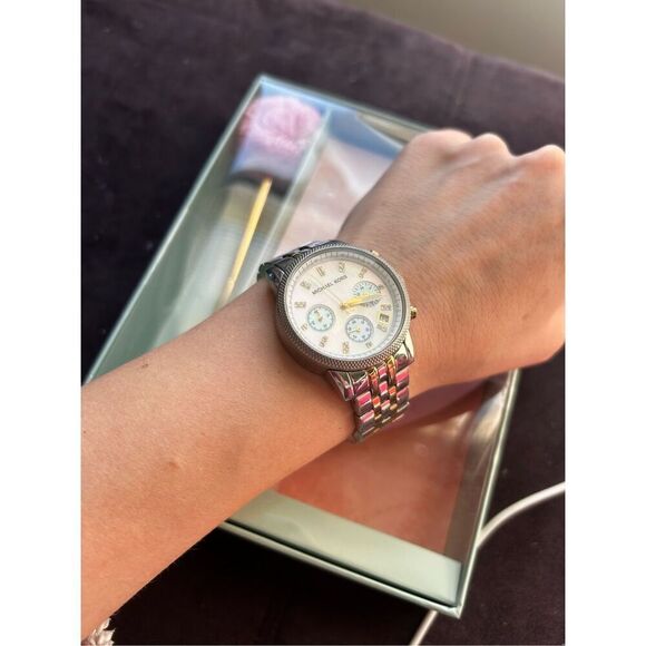 Michael Kors silver and gold watch with little diamonds inside - Picture 1 of 4